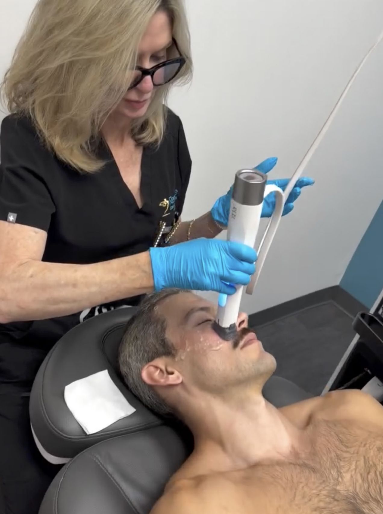 Debbie providing a XERF skin tightening RF treatment at Renuance